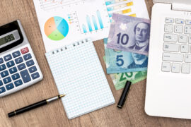 Founder reviewing startup finances to decide how much should a founder pay themselves first year startup