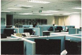 Empty modern office at night, illustrating the Polsia AI story of companies run with zero employees